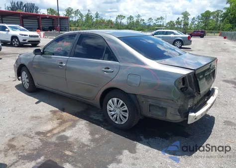 2003 Toyota Camry Le z USA, uszkodzony, nr VIN 4T1BE32KX3U737323